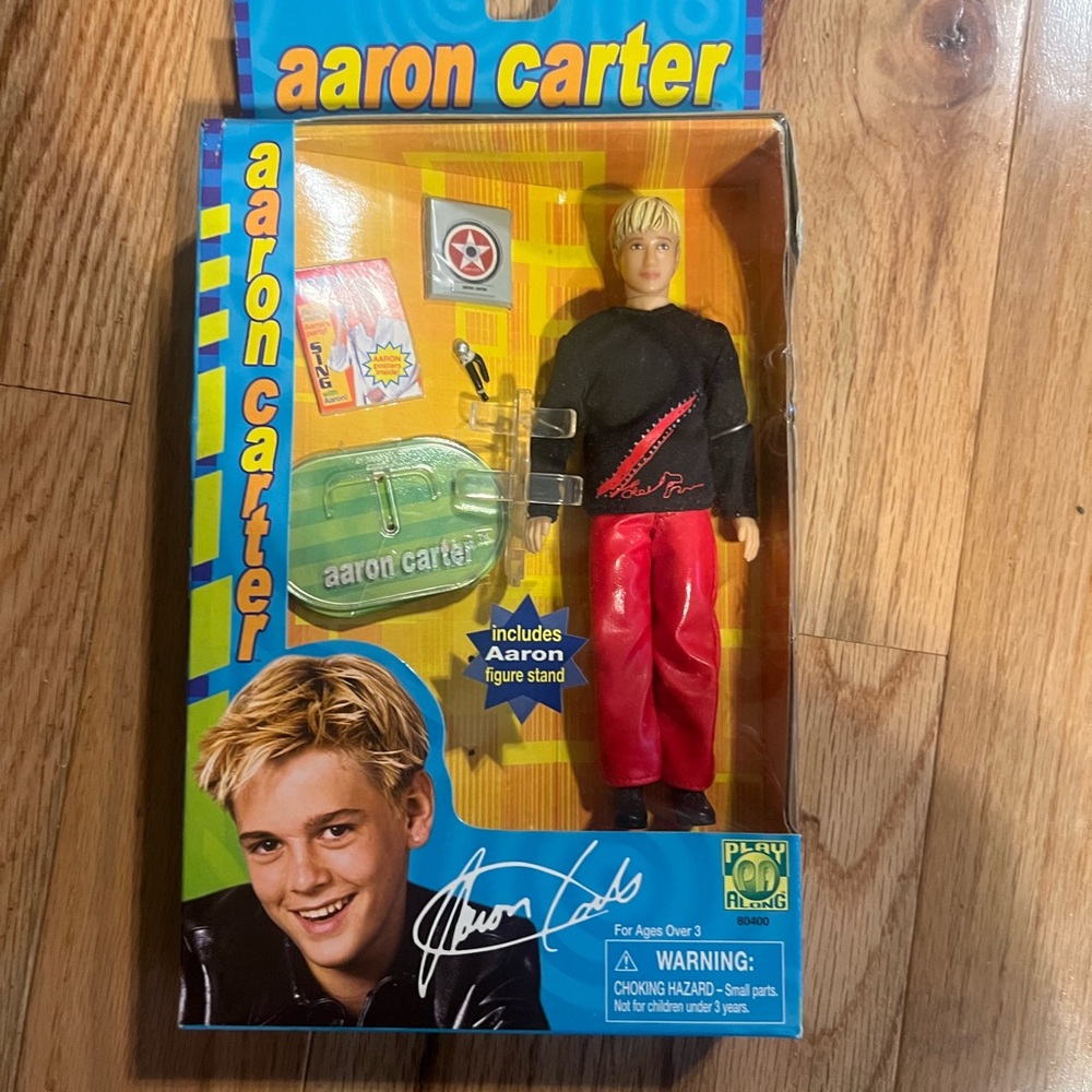 Aaron Carter mini Collectible Doll in black and red outfit